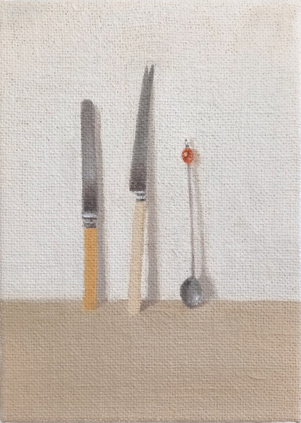 Two knives and a spoon