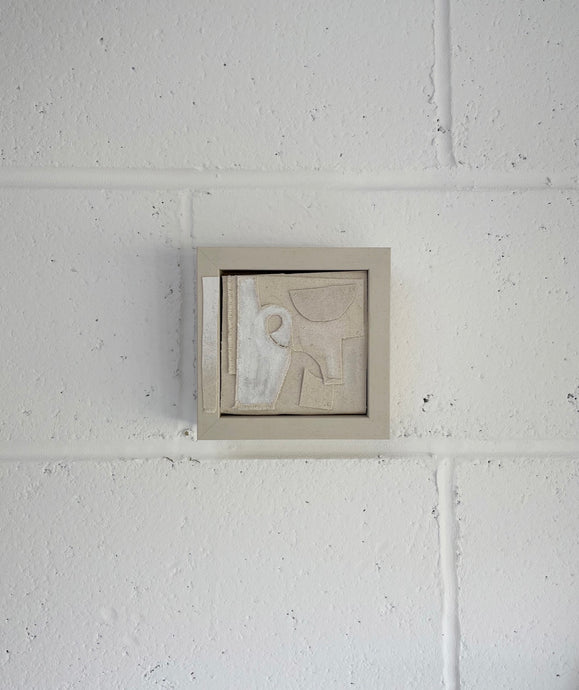 Ready-to-hang framed artwork by emerging artist Adriana Jaros, made using fabric and wood.