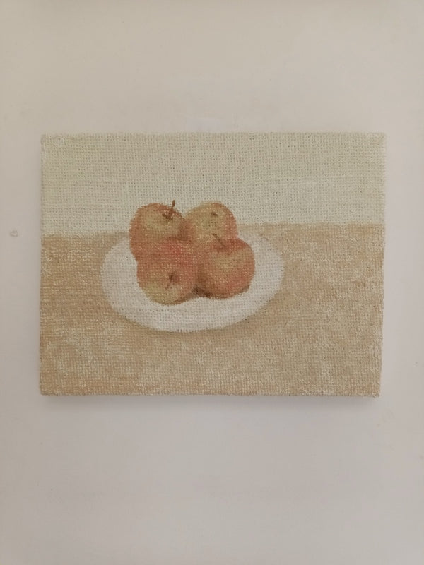 Apples in a dish