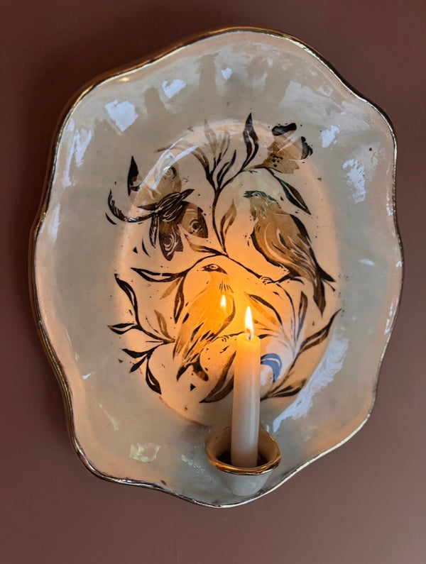 Bird and moth sconce
