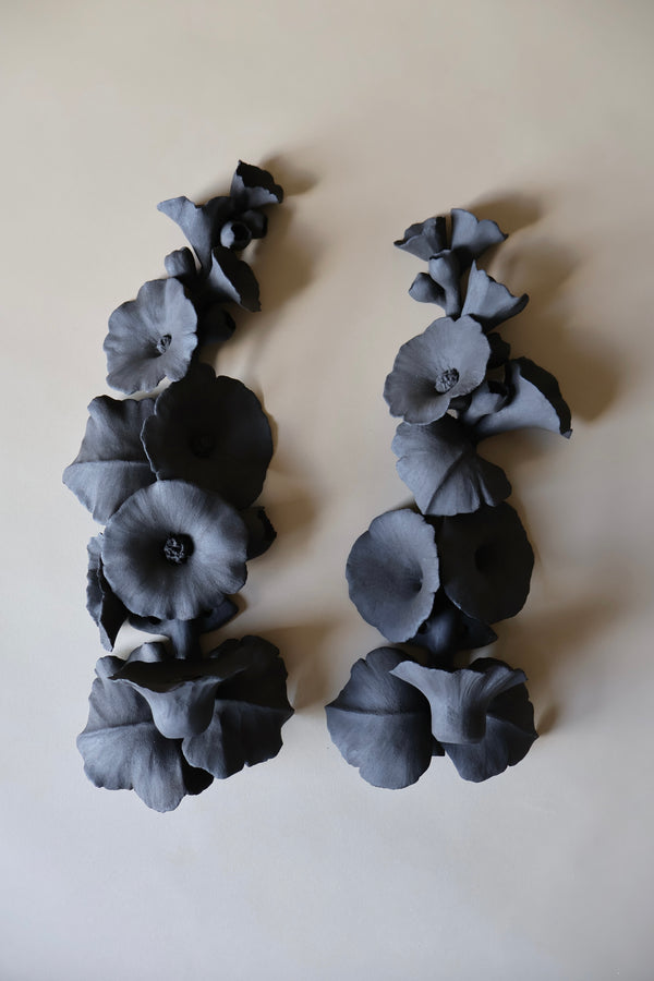 Black Hollyhock sconces (candle holders)