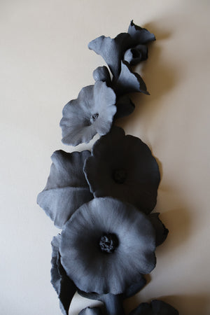 Black Hollyhock sconces (candle holders)