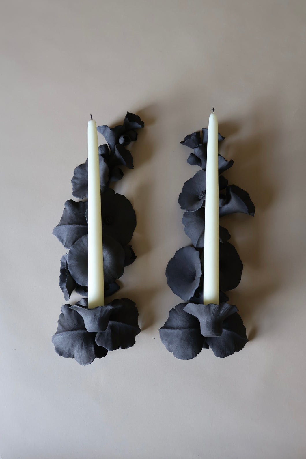 Black Hollyhock sconces (candle holders)