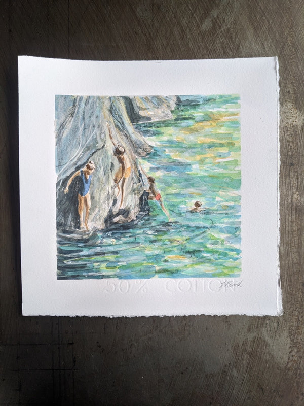 Children jumping off the rocks