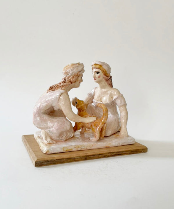 Two Vestals Stroking a Cat Candlestick