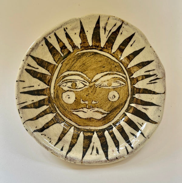 Tiny plate, sun