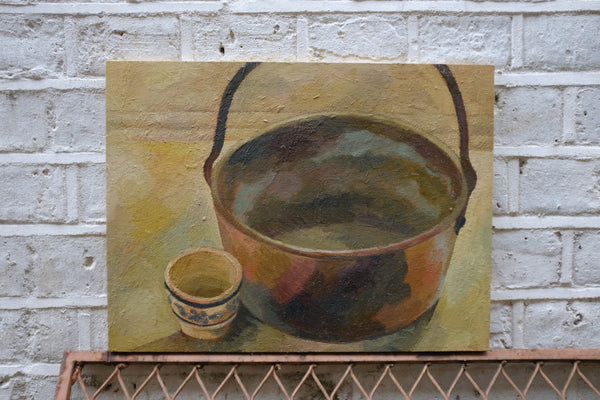 Metal Bucket Keeps a Small Cup Company