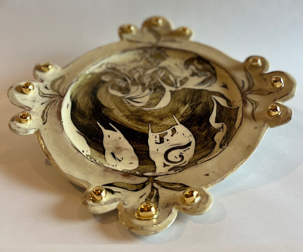 'No feeling is final' trefoil plate