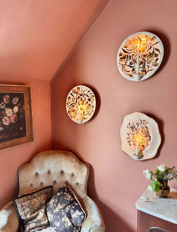 Bird and moth sconce