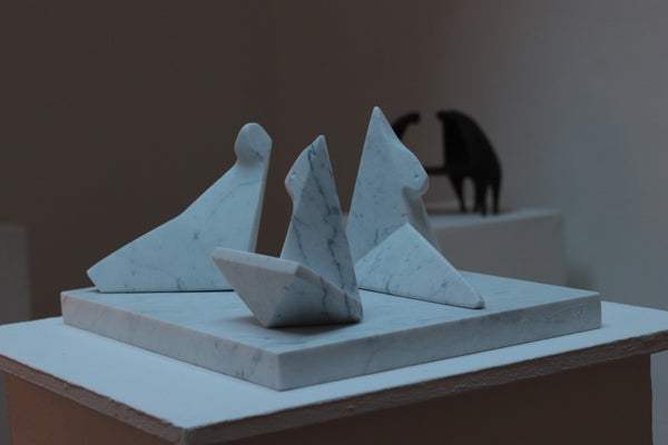Three Figures Reclining