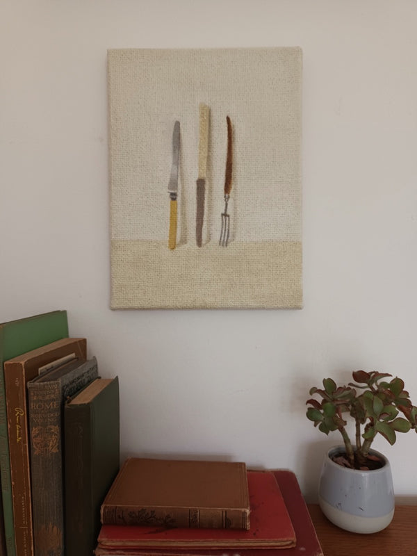 Two knives and a fork