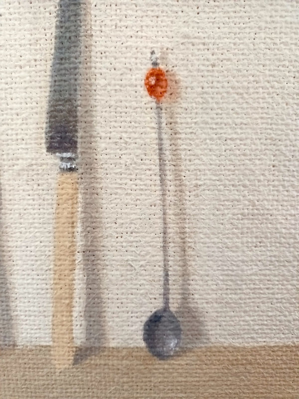 Two knives and a spoon
