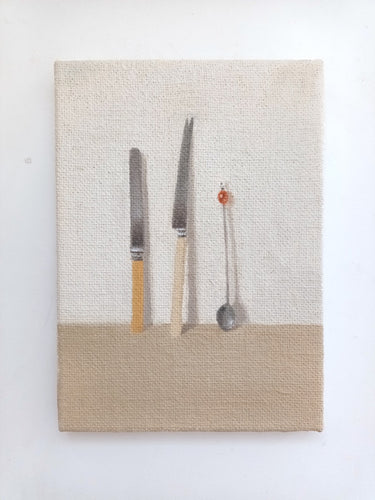 Two knives and a spoon
