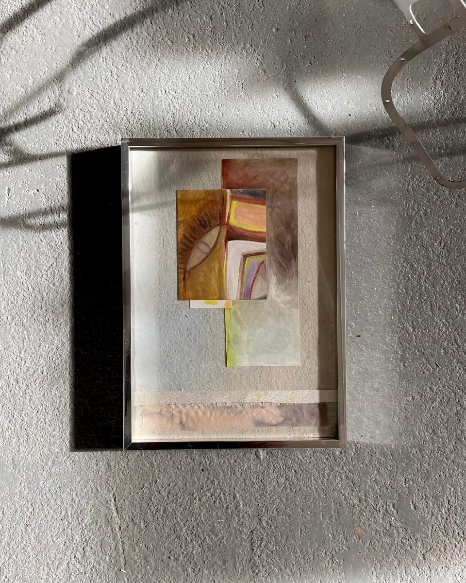 Minimalist shot of Adriana Jaros’ artwork displayed on a neutral grey surface for Partnership Editions.
