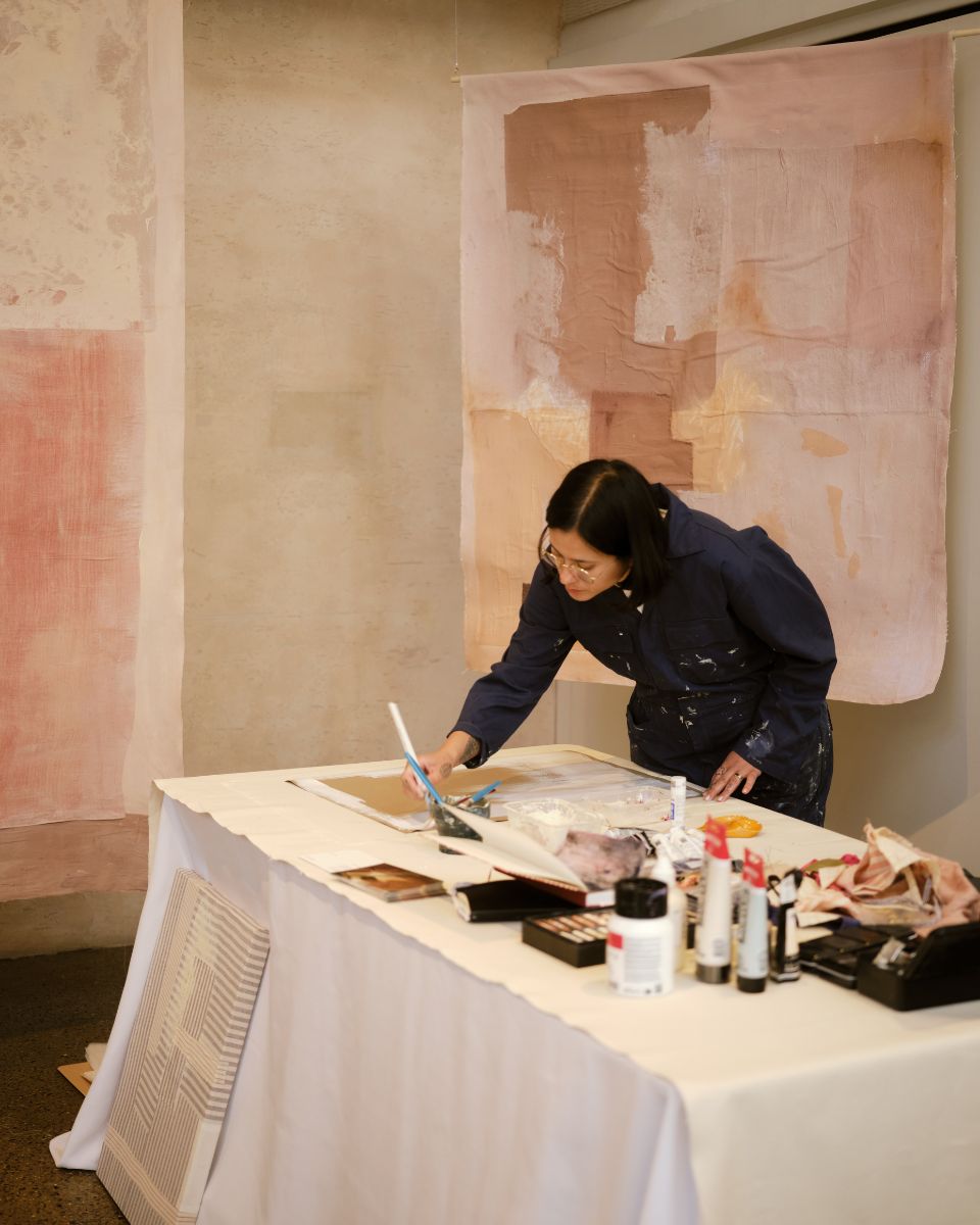 Ann-Marie Williamson working on textured original artwork on display for The Artists' Studio exhibition with Partnership Editions.