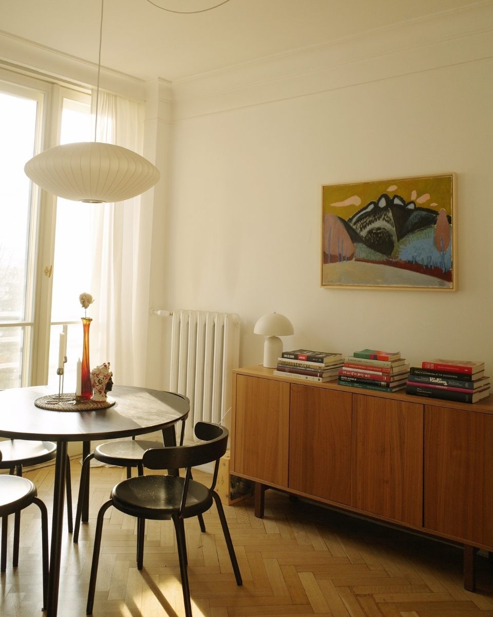 Interior lifestyle shot of a framed Emilia Durka painting displayed among contemporary furniture in her home studio for Partnership Editions.