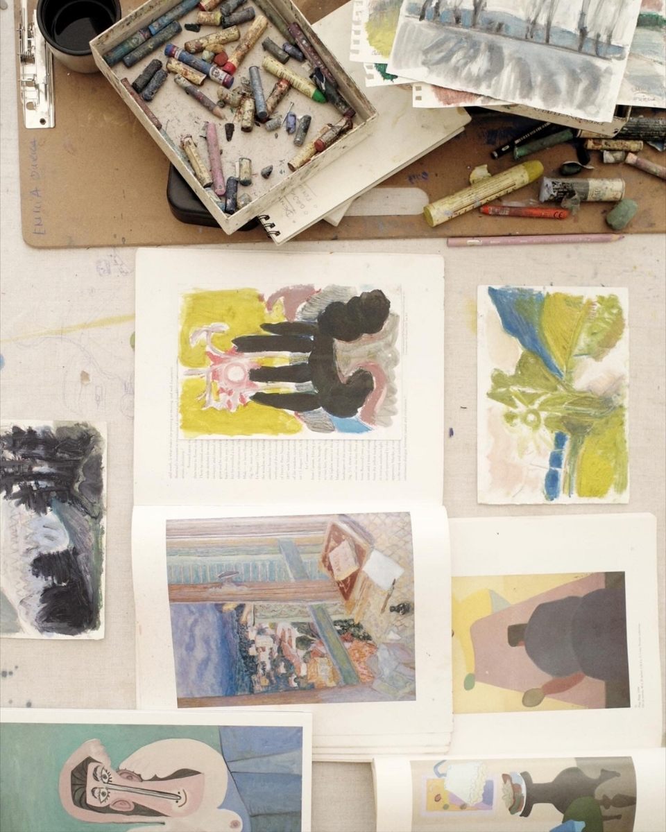 Detail shot of sketches, reference images, and coloured crayons in Emilia Durka’s home studio for Partnership Editions.