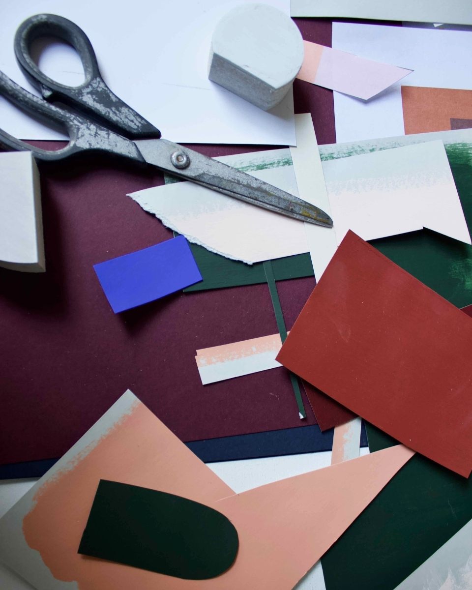Close-up detail of materials in Emily Forgot’s studio, featuring hand-cut paper scraps, professional scissors for Partnership Editions.