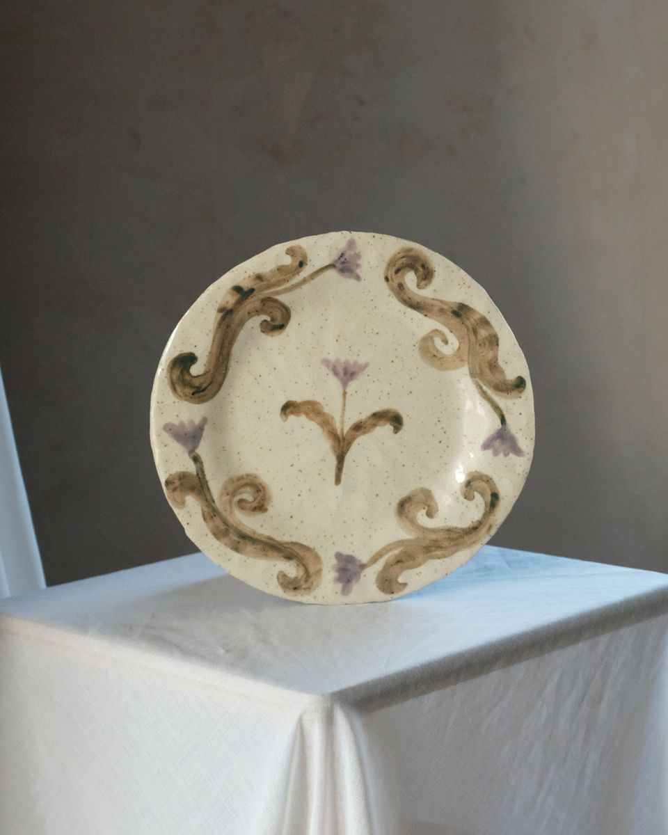Fanny Schultz hand-painted floral ceramic plate on stand for the November Drop 2024 at Partnership Editions.