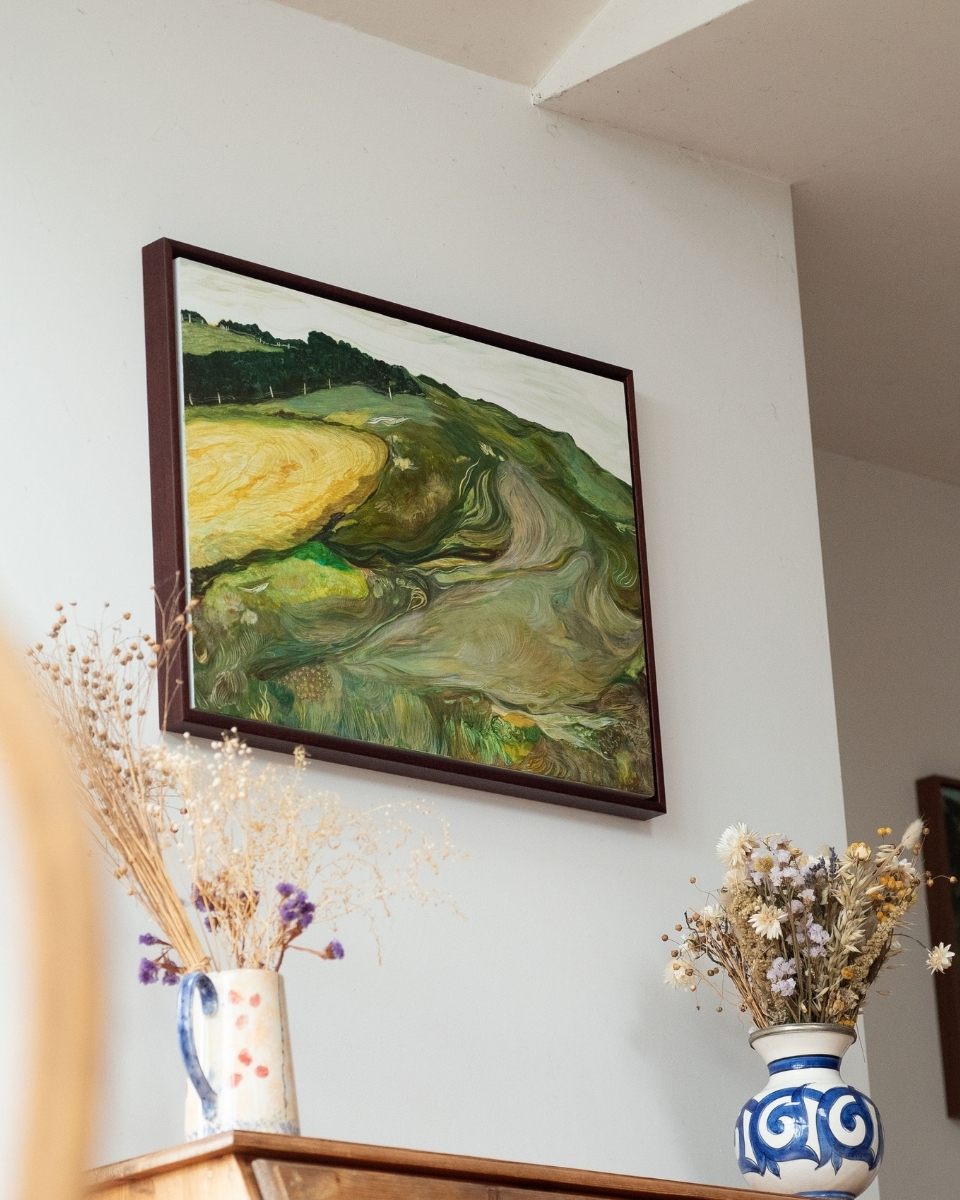 Professional shot of a luminous egg tempera landscape painting by Grace Crabtree, mounted on a gallery wall for Partnership Editions.