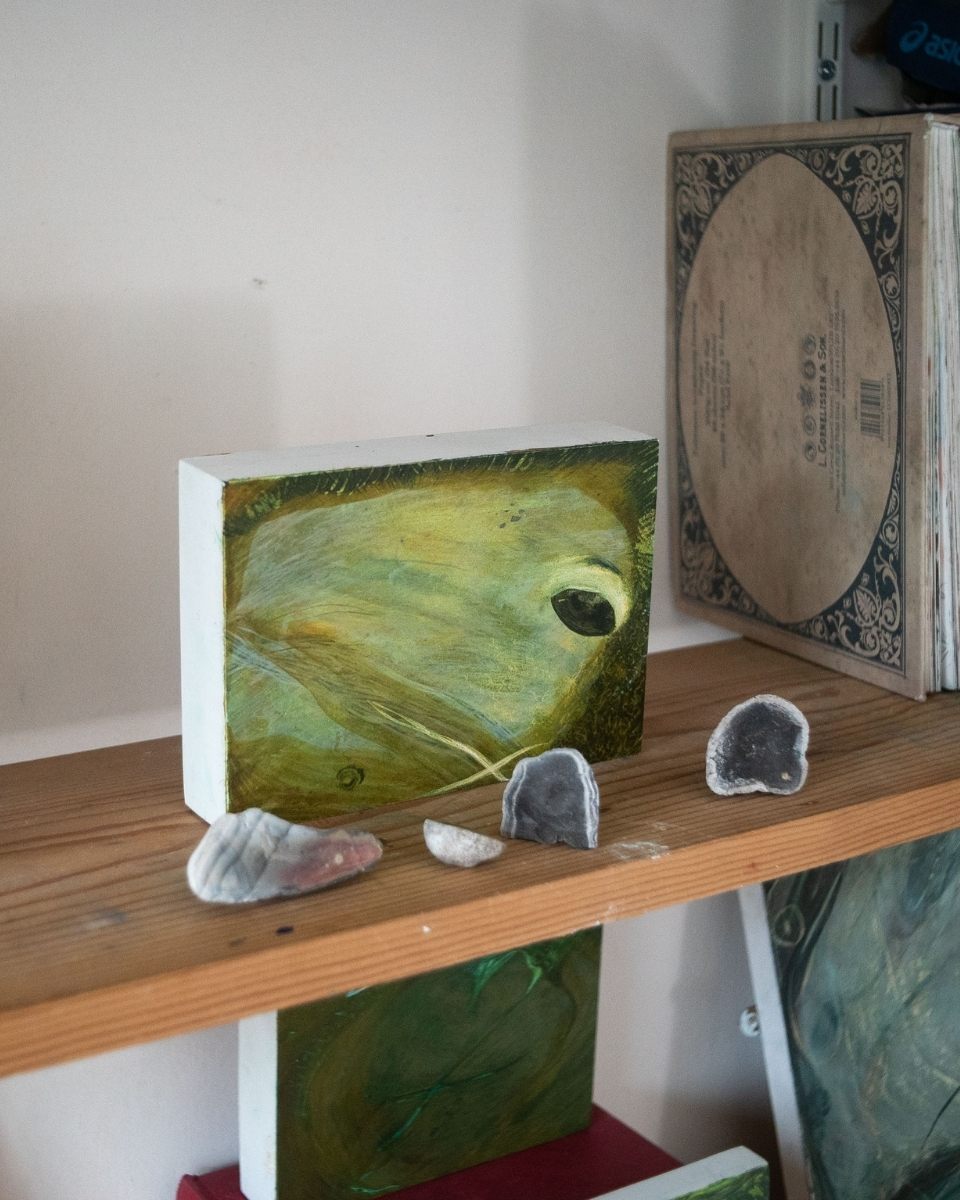 Detail shot of a small-scale, intimate landscape painting by Grace Crabtree displayed on a studio shelf for Partnership Editions.
