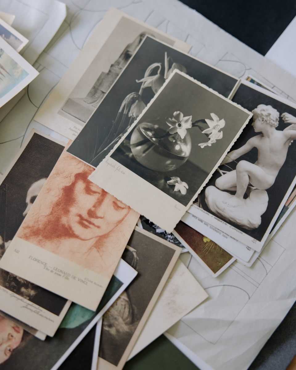 Detail shot of inspiration featuring postcards and references in Ines Fernandez de Cordova’s studio for Partnership Editions.