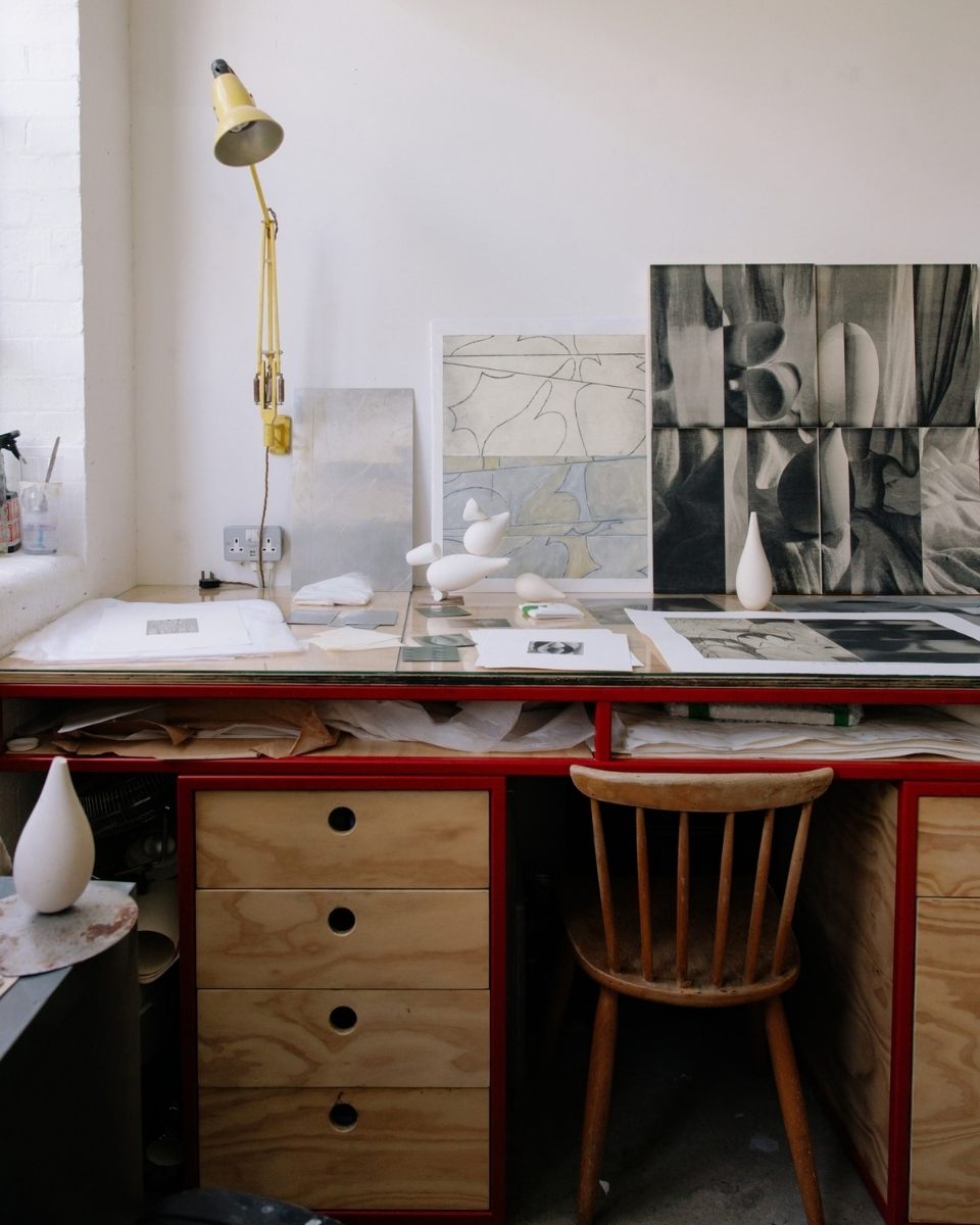 Detail shot of Ines Fernandez de Cordova’s studio desk, showcasing works in progress, sculptural models, and printmaking materials.