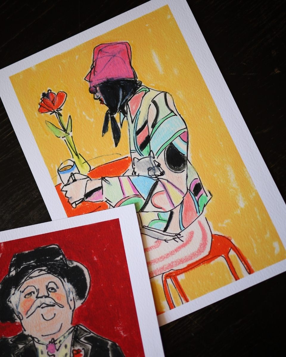 Close-up of two vibrant Isabella Cotier prints, 'Geometric Silk Shirt' and 'Lobster Claw', displayed at New River Cafe for Partnership Editions.