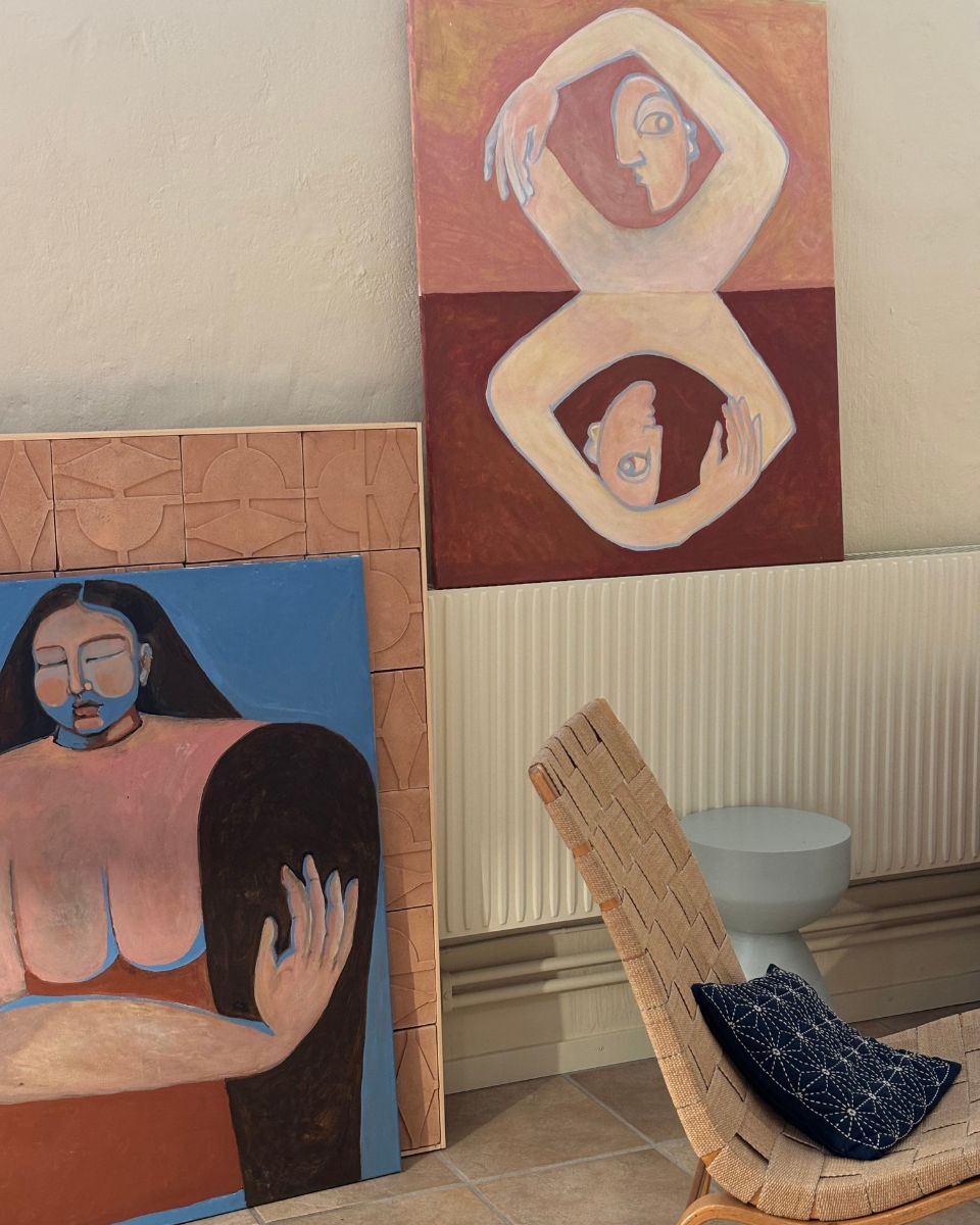 Josefin Tolstoy framed and unframed abstract paintings in her studio for the Partnership Editions Artist Collection.
