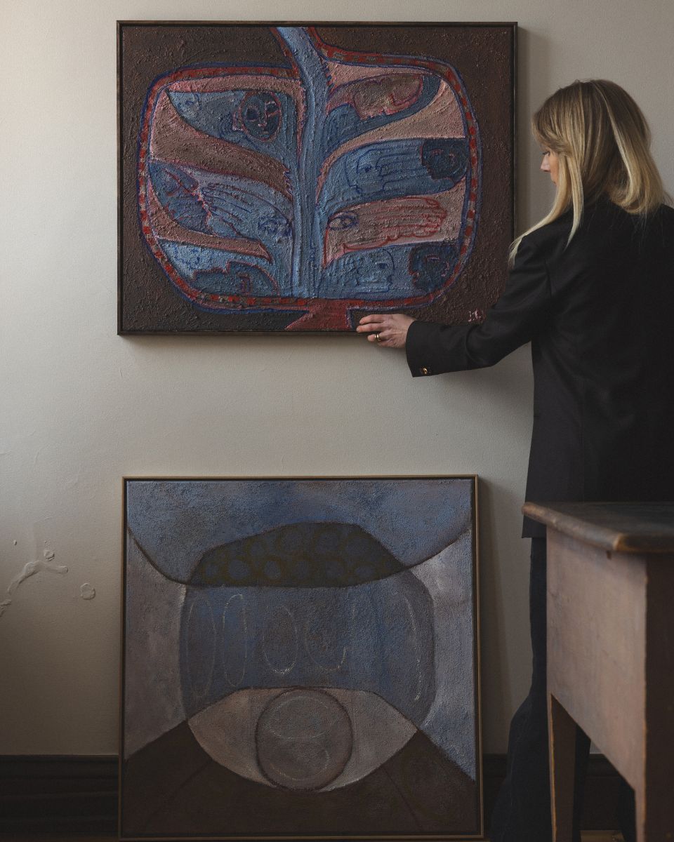 Josefin Tolstoy adjusting painting in her studio from her Solo Online Exhibition ‘Collected Life’ at Partnership Editions.