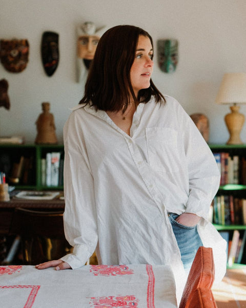 A professional portrait of creative director and designer Kaitlyn Coffee, serving as a judge on the selection committee for the Partnership Editions Artist Open Call 2026.