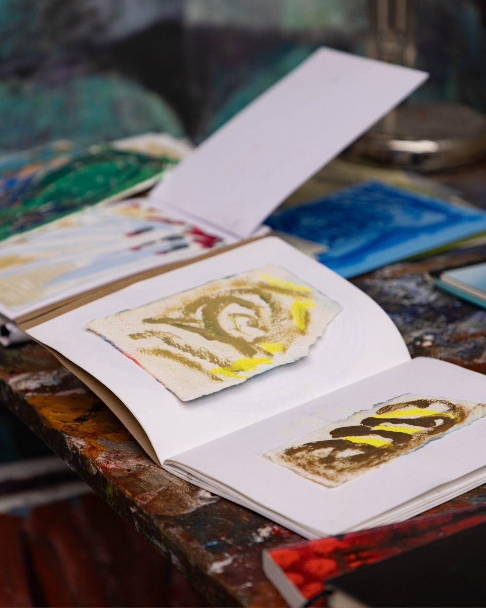 Studio shot of Katarina Lalic’s sketchbook, featuring drawings and compositional tests that lay the groundwork for her studio works.