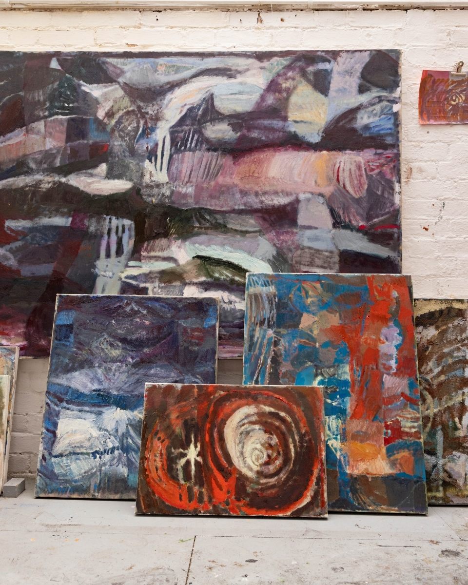 Interior of Katarina Lalic's Hackney studio, showcasing a curation of framed and unframed abstract oil paintings for Partnership Editions.