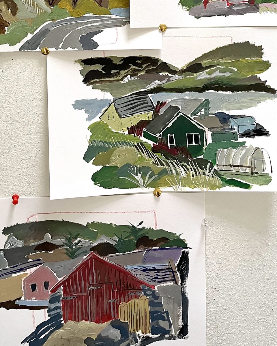 A studio wall showcasing Katie Moore's landscape sketches, an important part of her creative process.