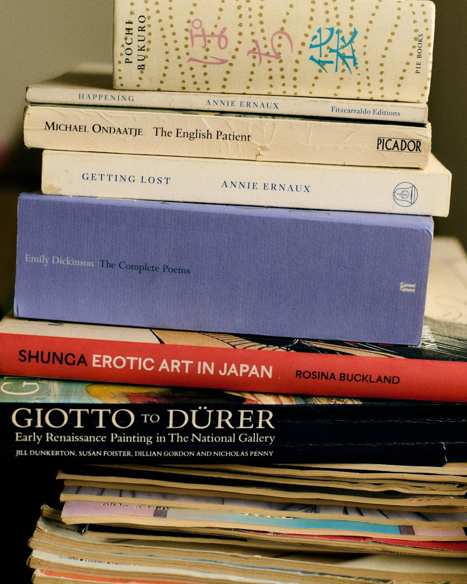 A series of art inspiration and film reference books stacked on top of each other in Keziah Mornin's studio.