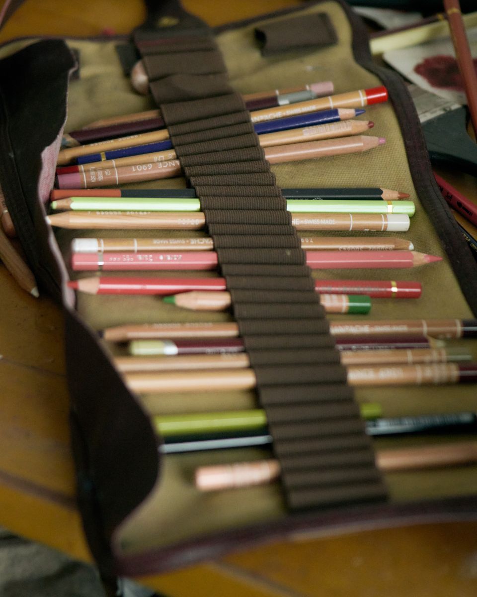 A studio pencil case showcasing Keziah Mornin's primary drawing utensils and coloured pencil mediums.