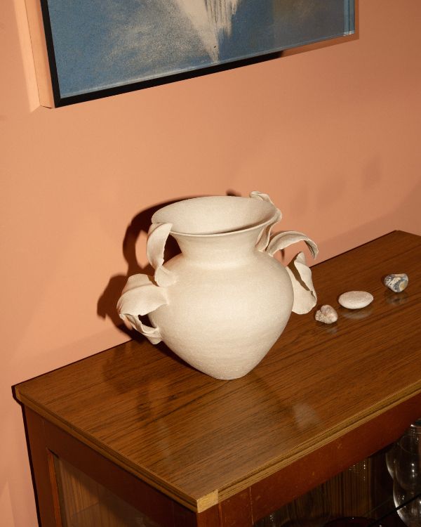 A small thumbnail preview showcasing a unique sculptural vase by Lucy Whitford for the Partnership Editions art advisory website footer icon.
