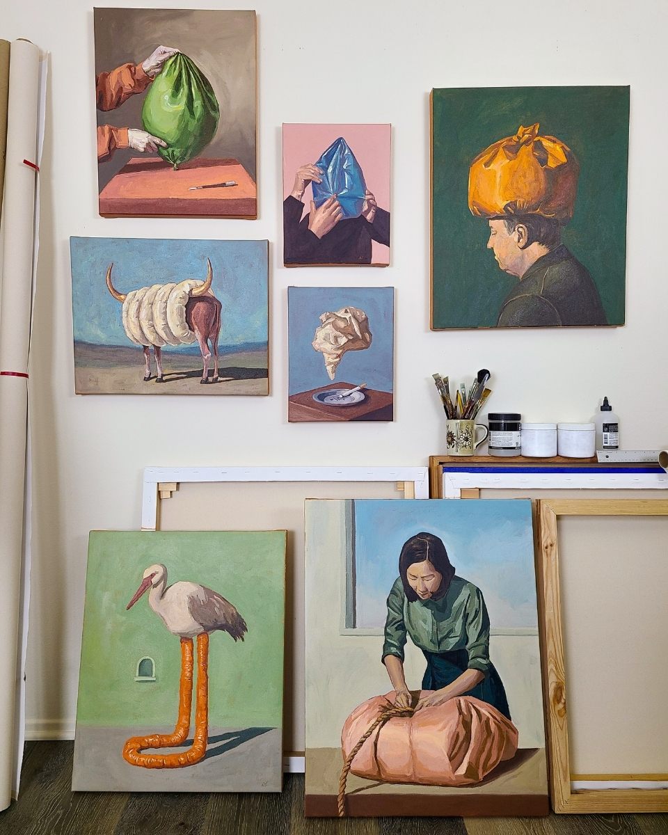A sneak peek inside Mamie Young’s Los Angeles studio, showing a curation of mounted and unmounted surrealist paintings for Partnership Editions.