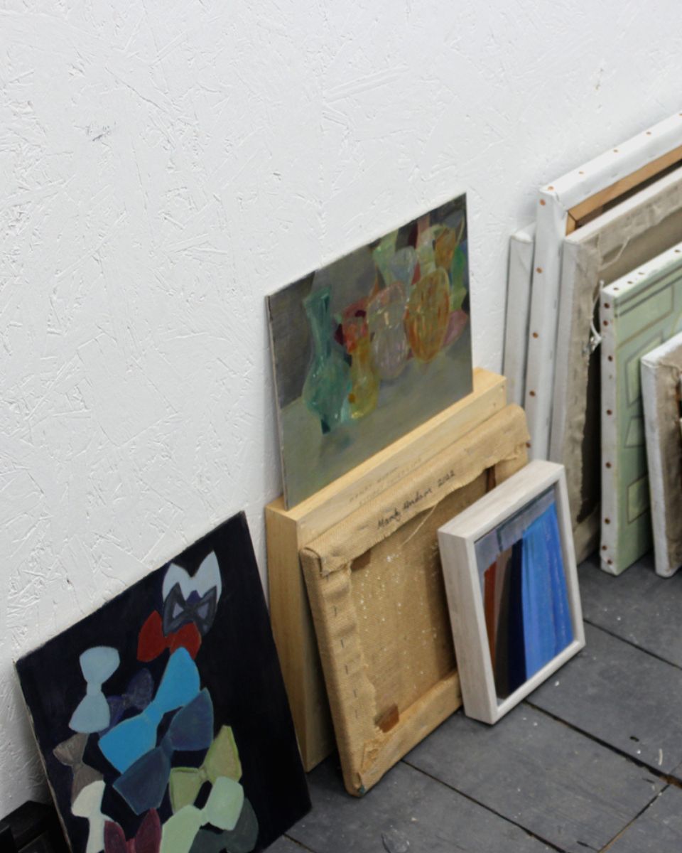 Collection of unframed and framed oil paintings in Mandy Hudson’s studio for the Mandy Hudson and Tabby Booth Artist Drop at Partnership Editions.