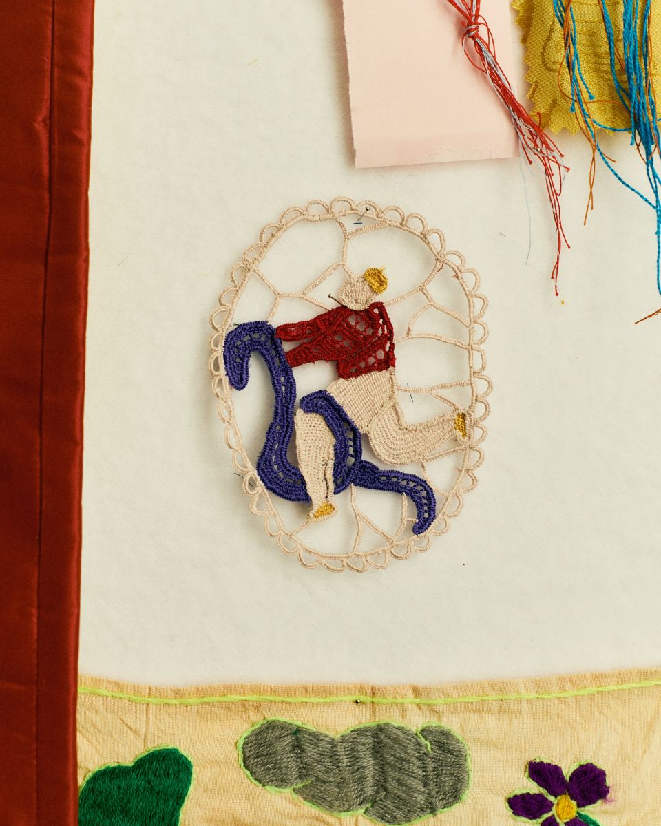 Close-up detail of a hollow embroidered figurine crafted by artist Molly Lester.
