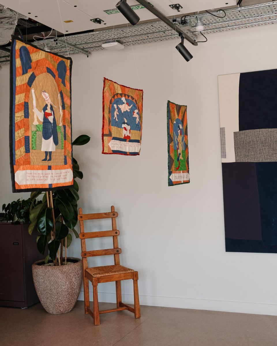Detailed textile tapestries by Molly Lester, featuring pictorial patchworks on display as part of the Dressing Up exhibition with Partnership Editions.