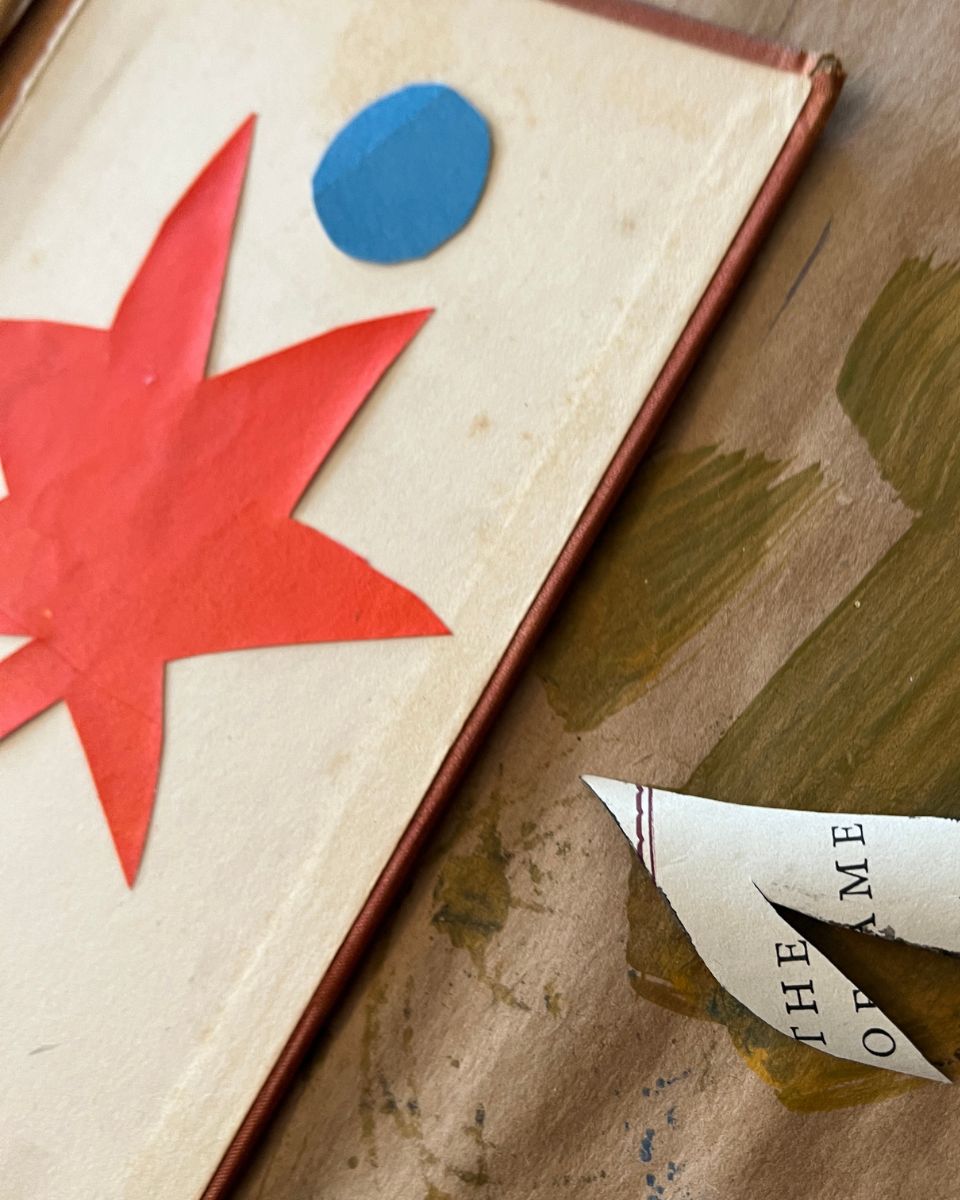 Close-up detail of a Nathan Isaac composition, highlighting the sharp edges and physical layers of his hand-painted paper collage.
