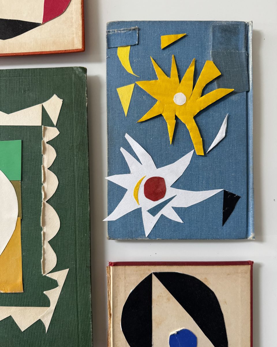 Detailed view of a single geometric artwork on Nathan Isaac’s studio wall, featuring his signature interlocking shapes and colourful tones.