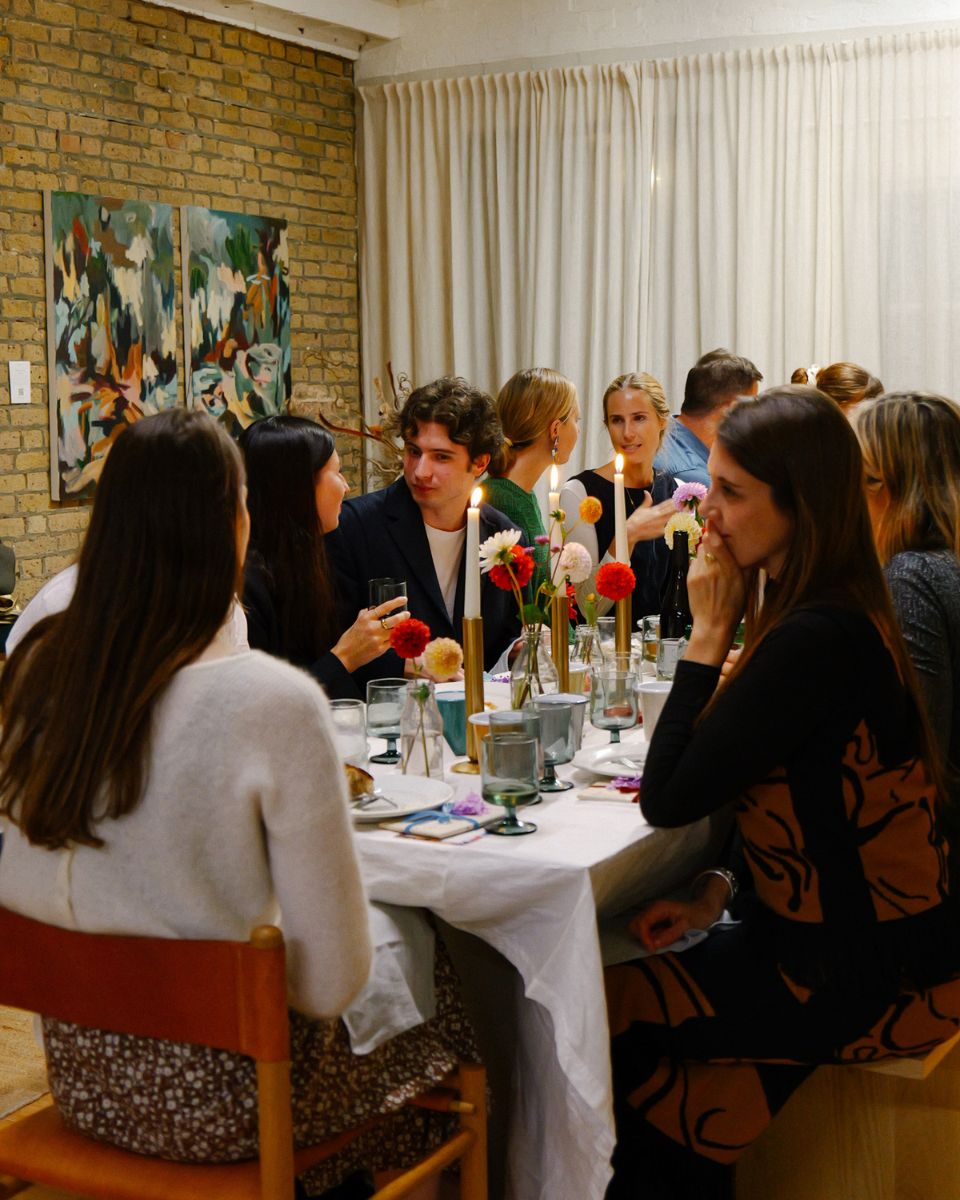 Artists and collectors enjoying an intimate dinner at Fred Rigby Studio for the 2023 Artist Open Call with Partnership Editions.
