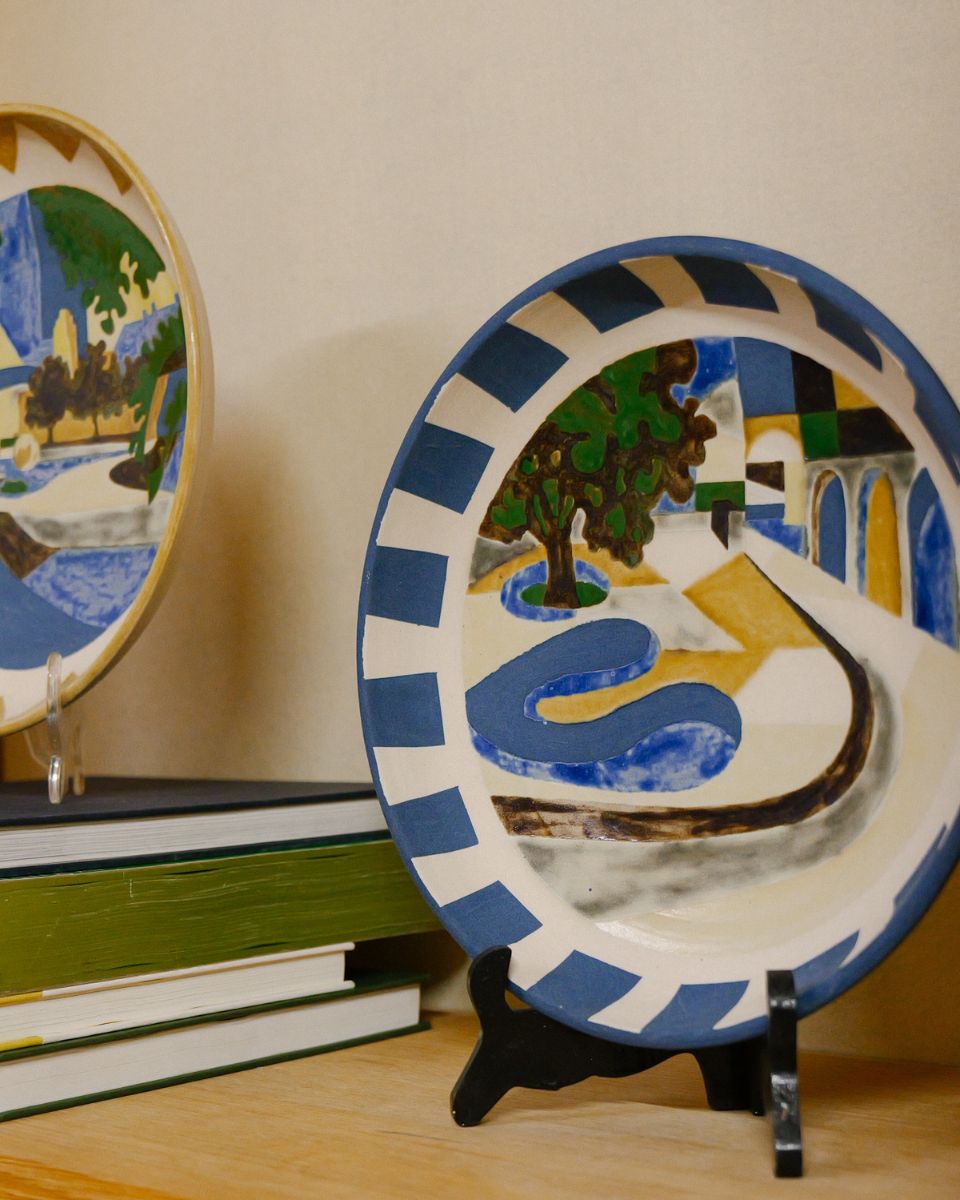Daniel Dzonu-Clarke hand-painted ceramic plates on display at Fred Rigby Studio for the 2023 Artist Open Call.