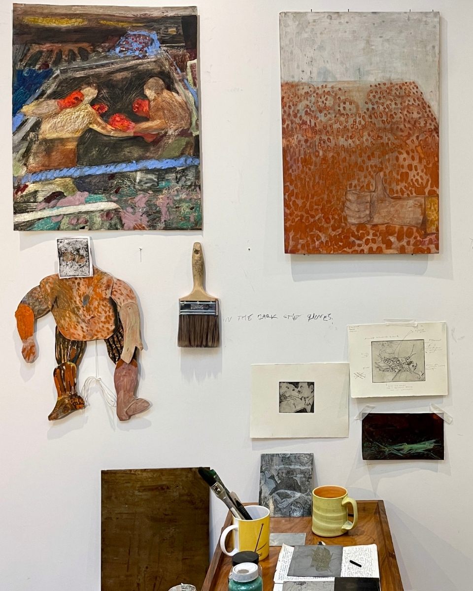Rebecca Ashton’s studio wall display, featuring a mix of finished artworks, handwritten notes, and sketches that form her visual storytelling. 