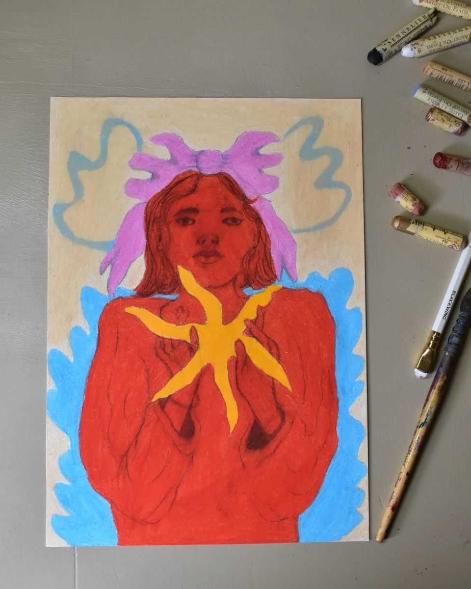 Detail shot of a Rebecca Sammon artwork in progress, positioned next to a vibrant set of colourful crayons used for her textural layering.
