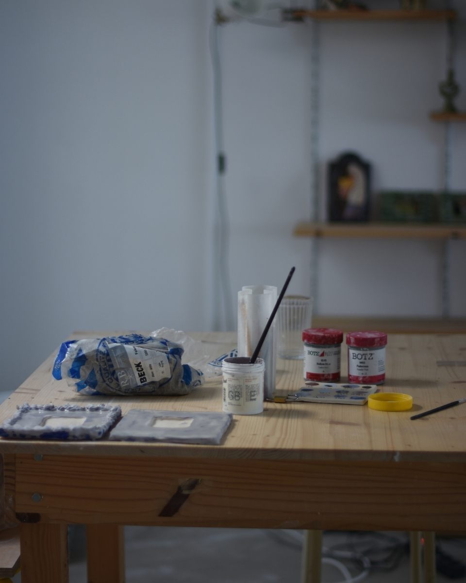 Detail shot of Samantha Kerdine’s studio desk, highlighting tools integral to her practice.