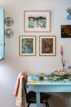 Load image into Gallery viewer, Colourful oil pastel landscapes in gallery wall by Camilla Perkins.
