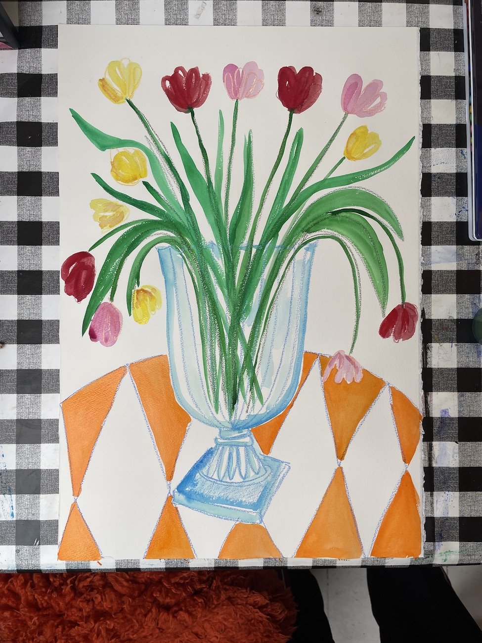 Marylebone tulips with orange table cloth